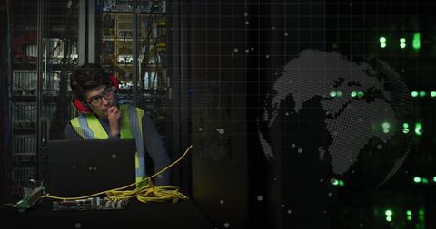 Asian Male Technician Analyzing Data in Server Room - Download Free Stock Images Pikwizard.com