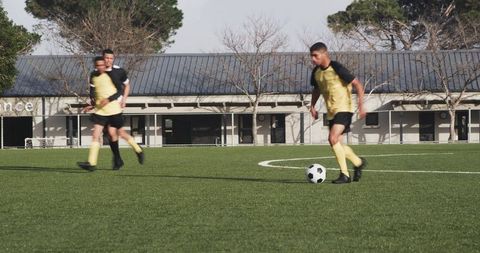 Soccer Players Practicing on Field Before Match Preparation