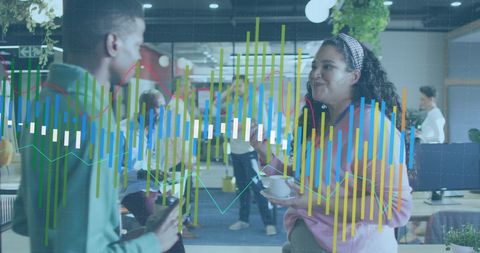 Business Colleagues Discussing Data Insights in Modern Office