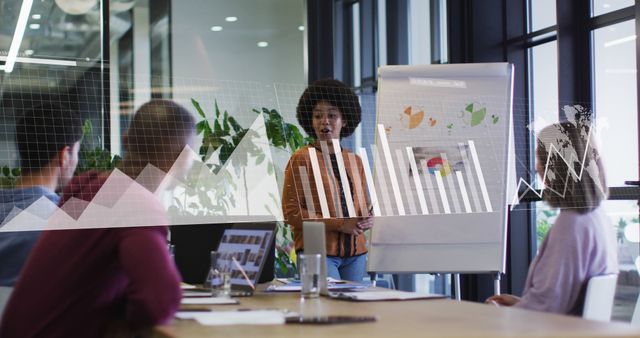 Businesswoman Leading Presentation in Modern Office with Team - Download Free Stock Images Pikwizard.com