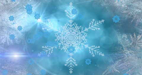 Glowing Snowflakes Amidst a Wintry Backdrop