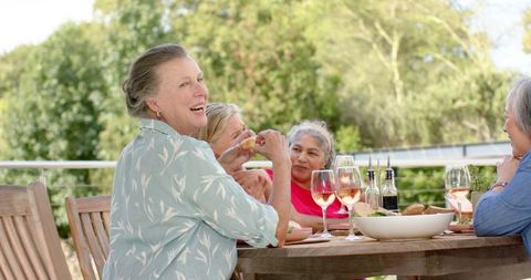 Group of Seniors Enjoying Outdoor Lunch Gathering - Download Free Stock Images Pikwizard.com