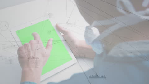 Doctor Using Tablet with Green Screen Conceptual Focus