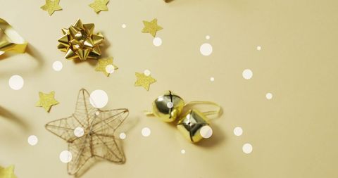 Holiday Festive Decor with Bells and Stars on Beige Background - Download Free Stock Images Pikwizard.com