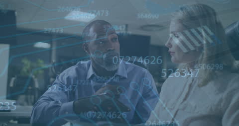 Business Team Analyzing Data with Holographic Interface