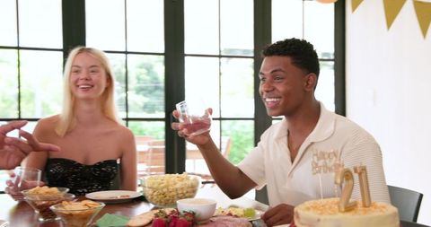 Happy Friends Celebrating Birthday with Summer Party Toast