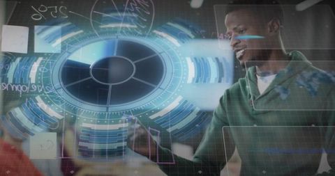 Innovative Engineer Analyzing Data on Holographic Interface in Office