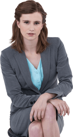 Confident Businesswoman Sitting on Chair Transparent Background
