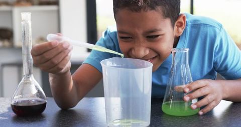 Curious Student Conducts Science Experiment in School Laboratory - Download Free Stock Images Pikwizard.com