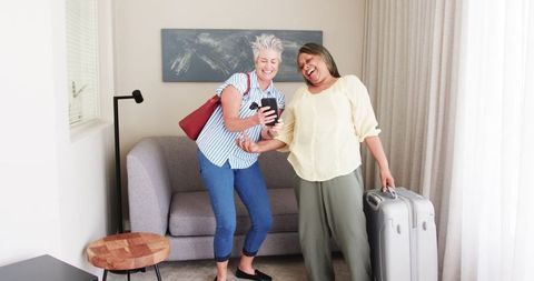 Senior Lesbian Couple Enjoying Vacation Selfie Moment