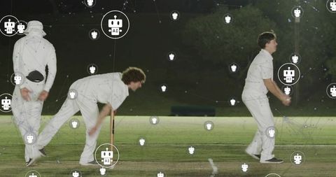 Night cricket bowler delivering under floodlights with teammates and ai network overlay