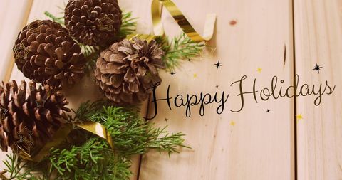 Festive Pine Cones and Happy Holidays Text - Download Free Stock Images Pikwizard.com