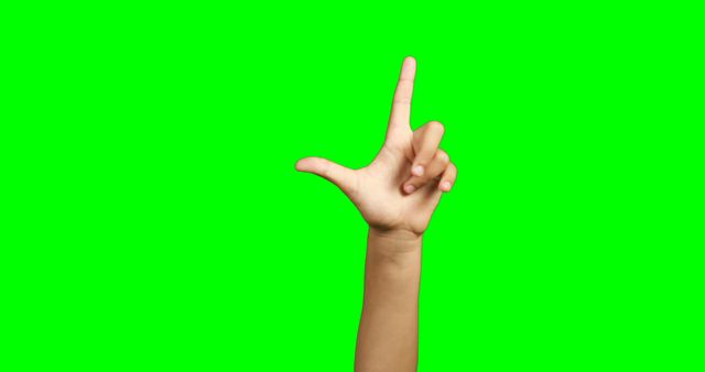 Child's Hand Making L Shape Against Green Background - Download Free Stock Images Pikwizard.com