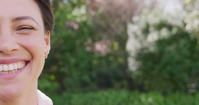 Smiling Woman with Nature Background on Sunny Day - Download Free Stock Images Pikwizard.com