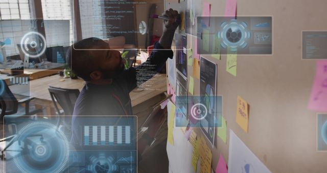 Man Analyzing Data on Board with Holographic Projections in Modern Office - Download Free Stock Images Pikwizard.com