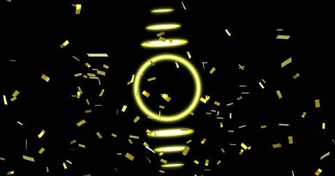 Neon yellow ring with falling gold confetti on black for celebration and event design