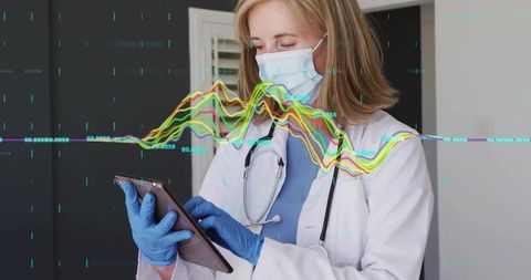 Doctor Using Tablet with Digital Graphs Overlay in Medical Office