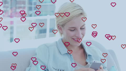 Joyful Woman Engaging with Smartphone and Floating Heart Icons