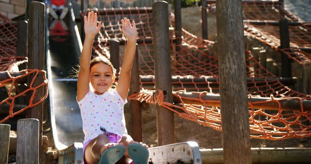 Young Girl Enjoying Playground Slide Adventure Fun - Download Free Stock Images Pikwizard.com