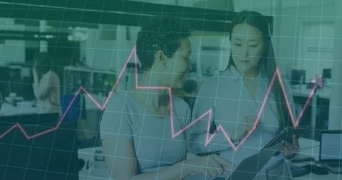 Business Colleagues Analyzing Data with Overlay Graph