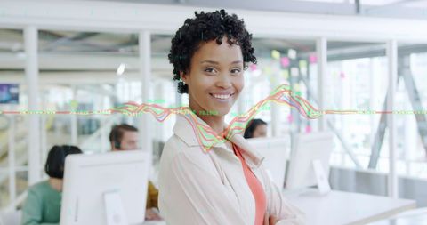 Successful Businesswoman Celebrating Data Success in Modern Office