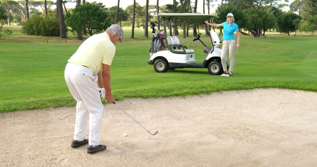 Golf players playing together at golf course 