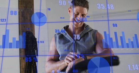 Mid-adult man checking smartwatch in home gym with ar fitness metrics overlay