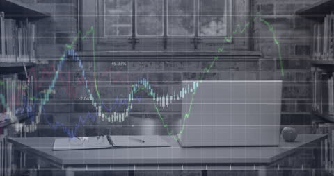 Laptop on Desk with Financial Data Animation Overlay