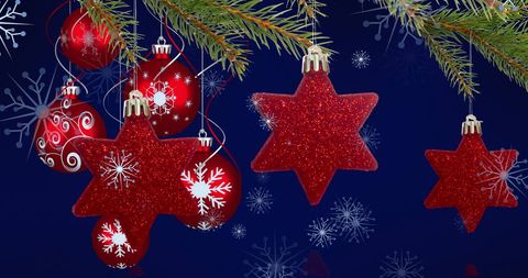 Sparkling Red Christmas Ornaments and Falling Snowflakes on Dark Background - Download Free Stock Images Pikwizard.com