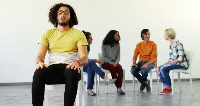 Individuals Seated in Support Group Discussion in Bright Room - Download Free Stock Images Pikwizard.com