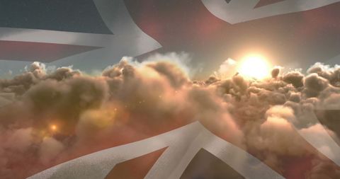 Sunburst Through Stormy Clouds overlaying Union Jack Flag - Download Free Stock Images Pikwizard.com