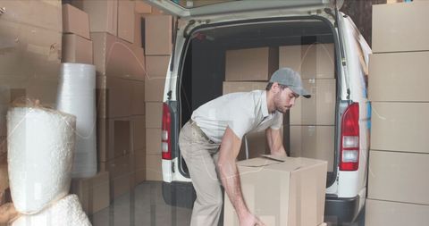 Man Loading Van with Cardboard Boxes for Global Shipping - Download Free Stock Images Pikwizard.com
