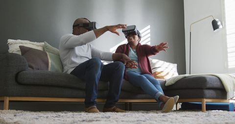 Senior African-American Couple Enjoying Virtual Reality in Living Room - Download Free Stock Images Pikwizard.com