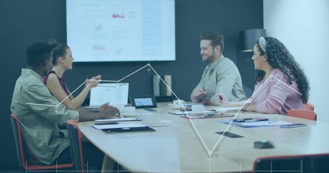 Business Team Analyzing Online Data in Modern Office