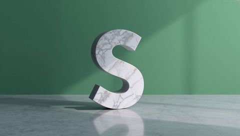 3d marble letter s against green wall with soft shadow