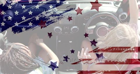 Young Women in Convertible Celebrating American Patriotism