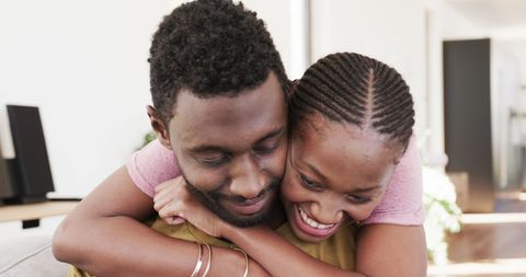 Happy Couple Embracing in Cozy Home Environment - Download Free Stock Images Pikwizard.com