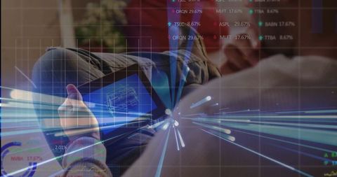 Asian Man Analyzing Blueprint on Tablet with Data Overlays