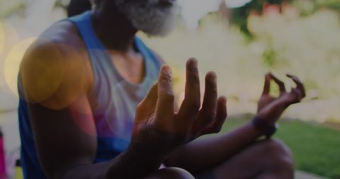 African American Man Meditating Outdoors Focused on Inner Peace