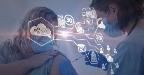 Nurse administering vaccine to masked patient with holographic medical icons