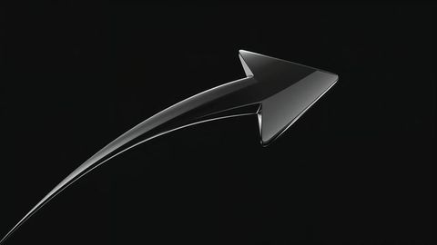 Sleek metallic curved arrow with reflective finish on black background