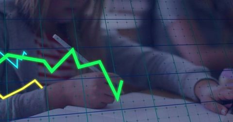 Children Writing at Desk with Digital Graph Overlay Showing Classroom Learning and Data