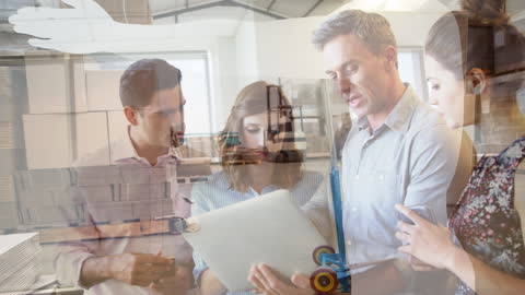 Team Collaborating on Project in Modern Office Space