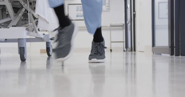 Abstract View of Healthcare Worker Walking in Hospital Corridor - Download Free Stock Images Pikwizard.com