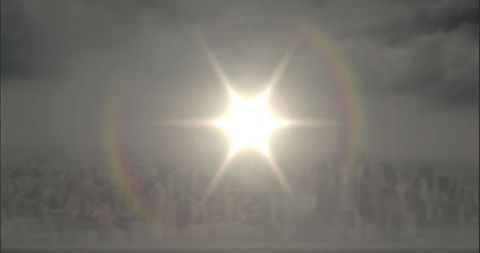 Radiant sunburst over modern cityscape