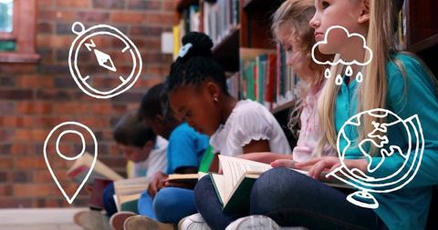 Diverse children reading together in sunlit school library corner holding books by brick wall