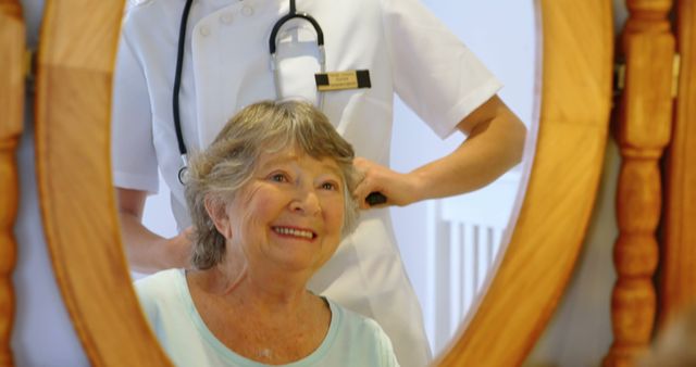 Elderly Woman Receiving Haircare from Caregiver in Healthcare Facility - Download Free Stock Images Pikwizard.com