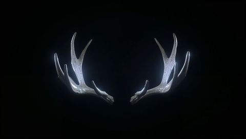 Glowing Deer Antlers Floating in Dark Minimal Display with Halo Lighting and Symmetry
