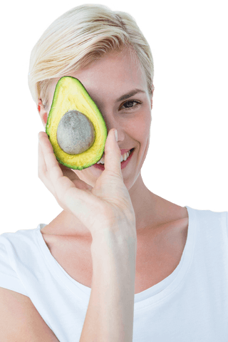 Woman holding fresh avocado displaying transparent ingenuity