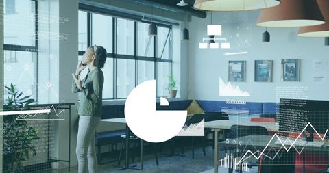 Businesswoman Talking on Smartphone in Modern Office Lounge with Data Overlay